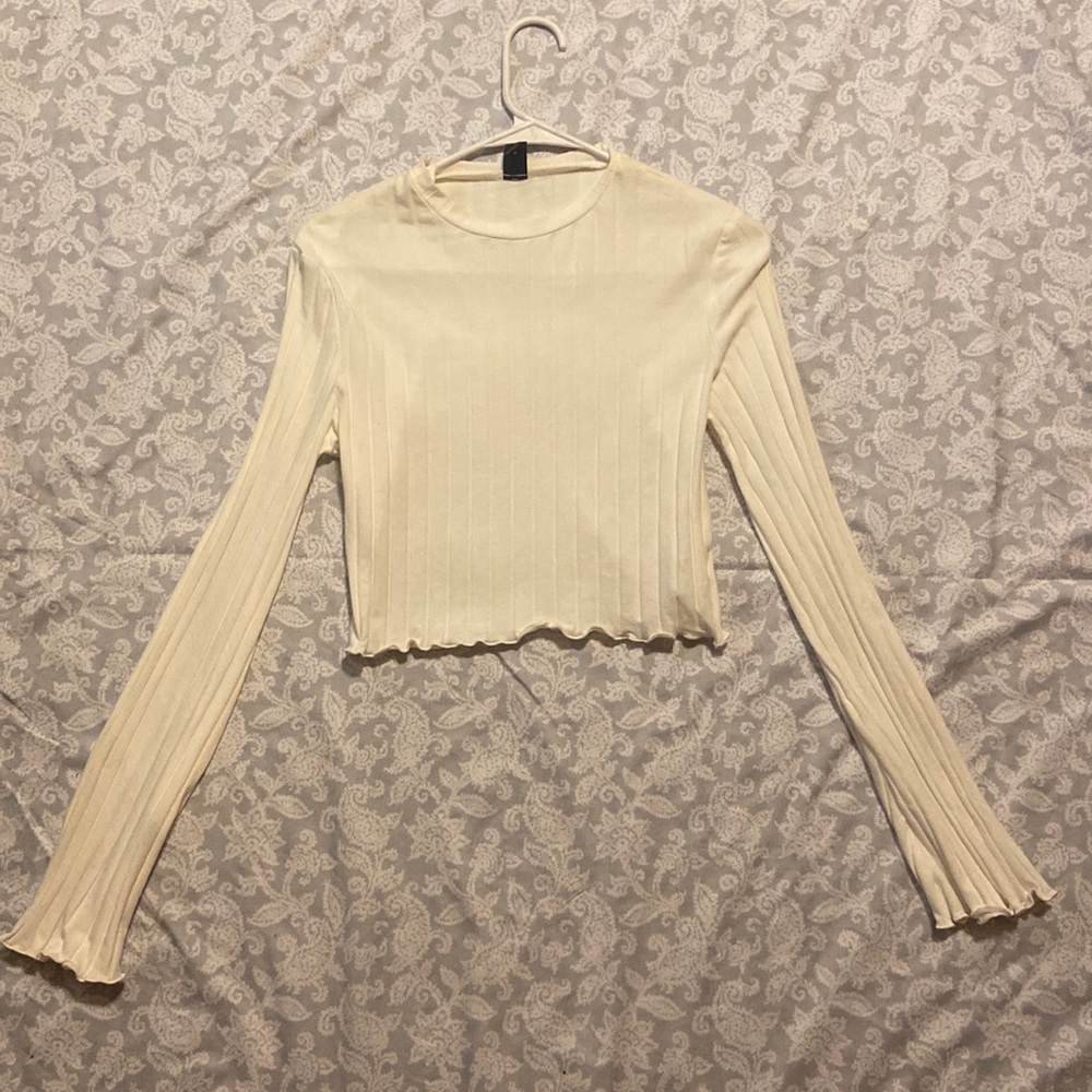 Long sleeve cream colored crop top